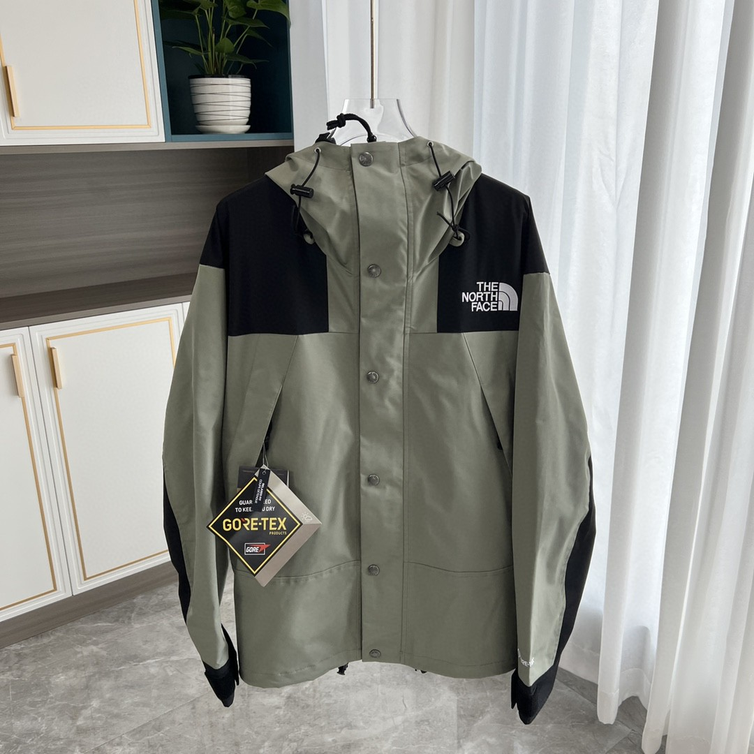 The North Face GORE-TEX Waterproof Hooded Mountain Jacket, Sage Green and Black Colorblock Outdoor Windbreaker
