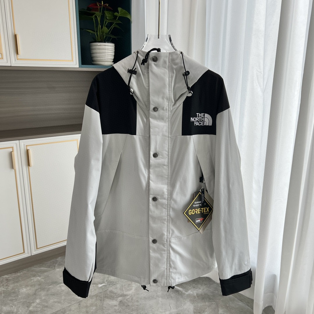 The North Face GORE-TEX Waterproof Hooded Mountain Jacket, Gray and Black Colorblock Outdoor Windbreaker