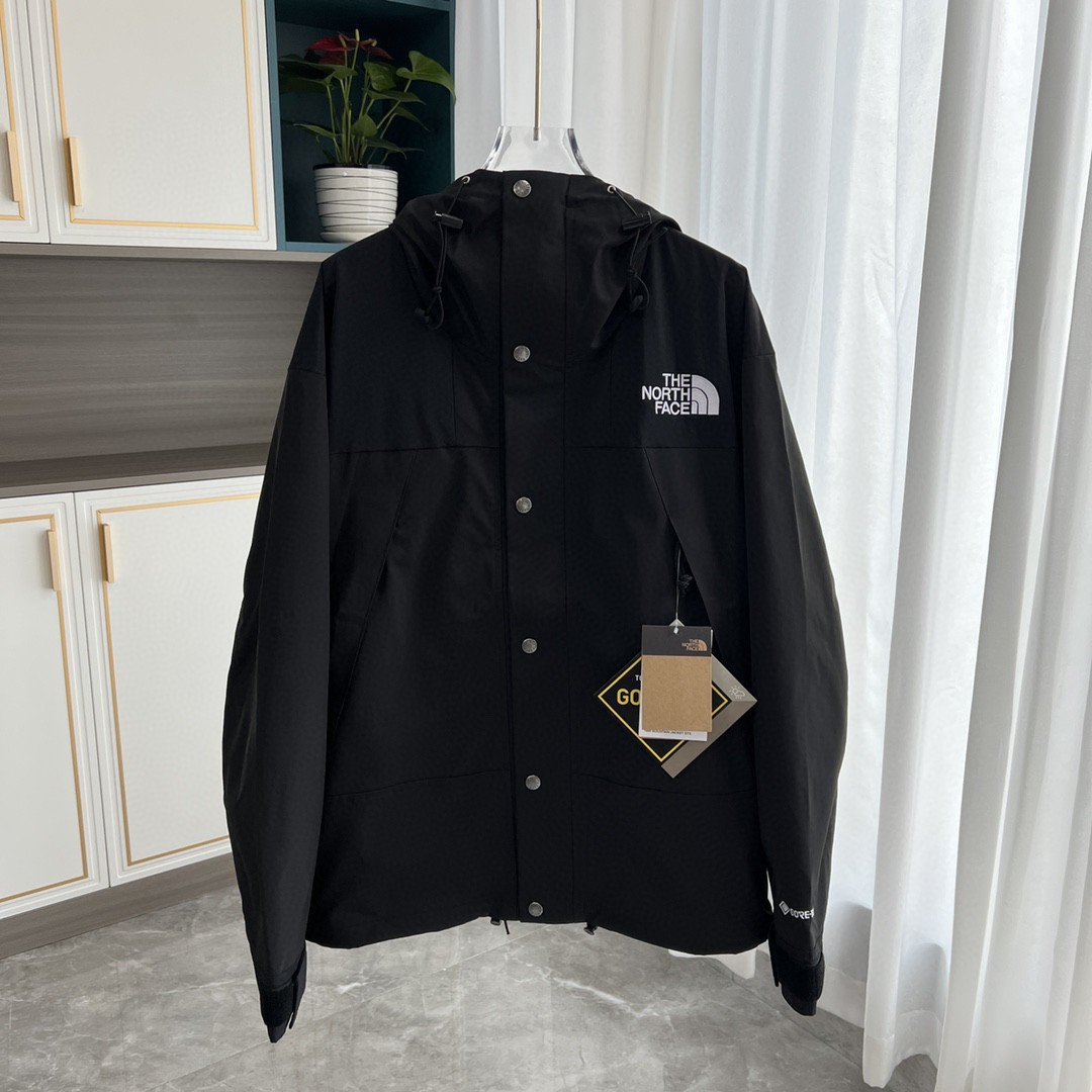 The North Face GORE-TEX Waterproof Hooded Mountain Jacket, All Black Outdoor Windbreaker with Embroidered Logo