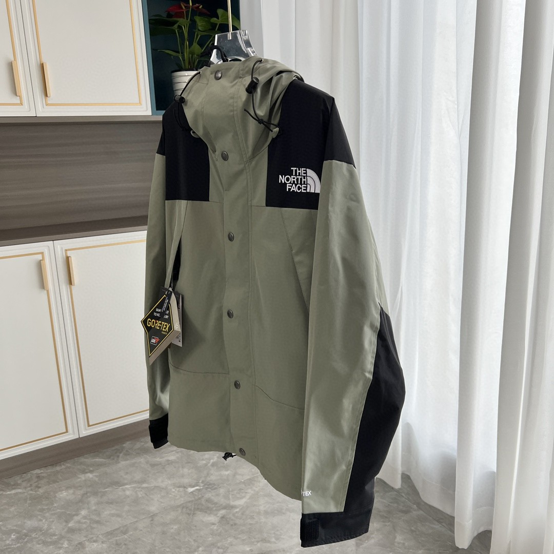 The North Face GORE-TEX Waterproof Hooded Mountain Jacket, Sage Green and Black Colorblock Outdoor Windbreaker