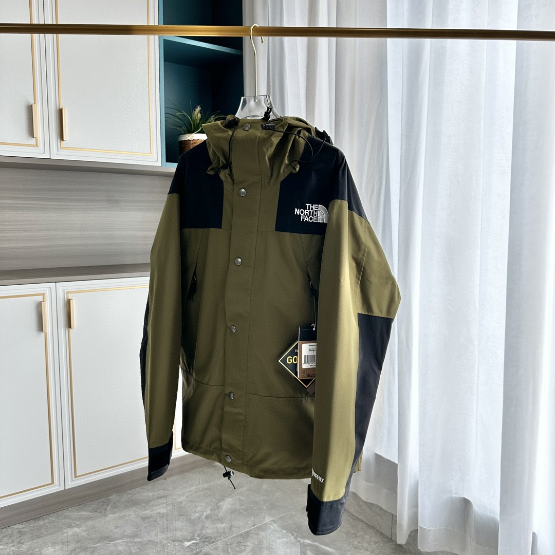 The North Face GORE-TEX Waterproof Hooded Mountain Jacket, Olive Green and Black Colorblock Outdoor Windbreaker