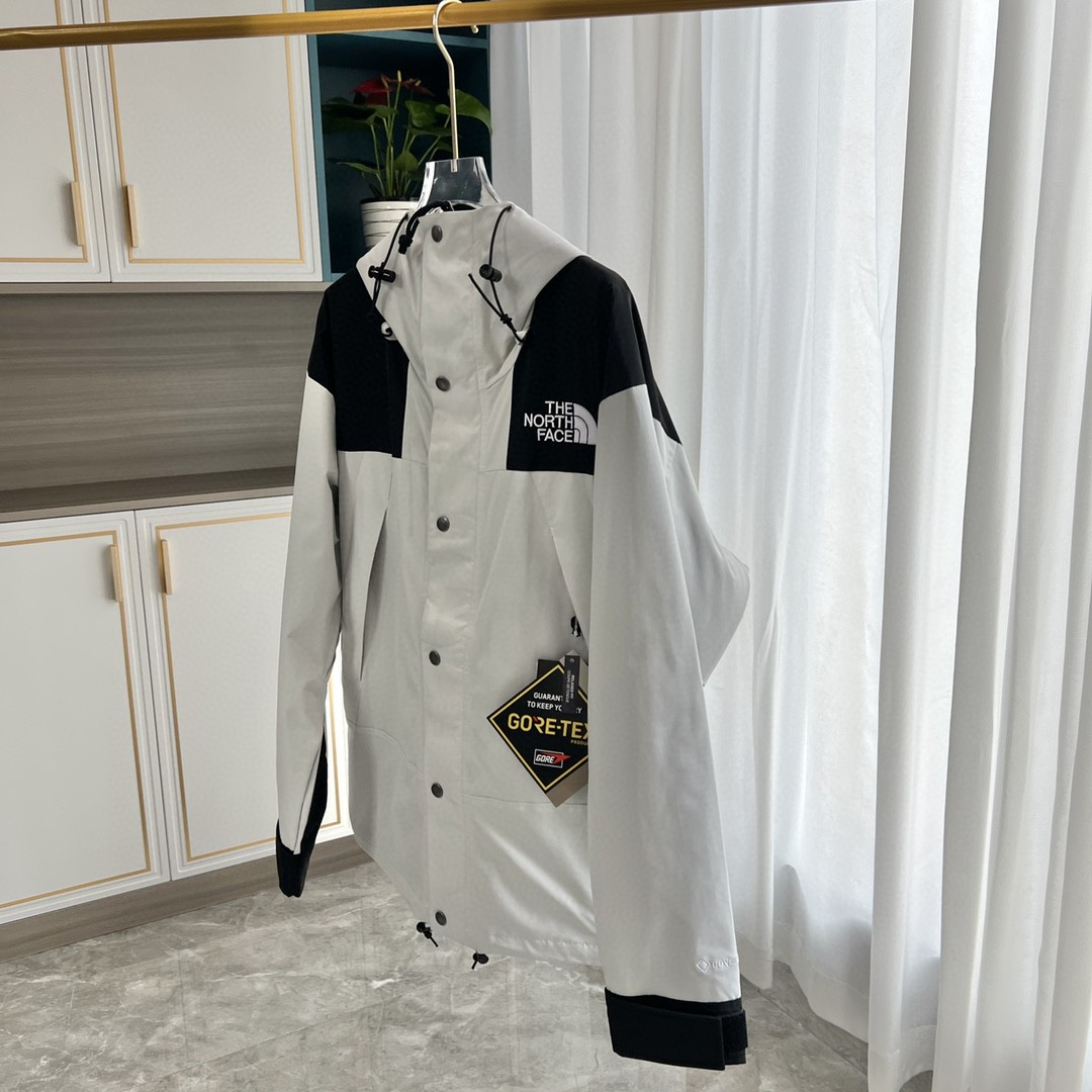 The North Face GORE-TEX Waterproof Hooded Mountain Jacket, Gray and Black Colorblock Outdoor Windbreaker
