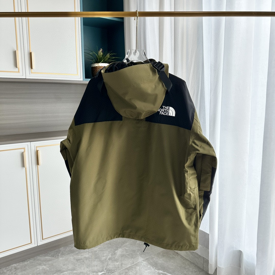 The North Face GORE-TEX Waterproof Hooded Mountain Jacket, Olive Green and Black Colorblock Outdoor Windbreaker