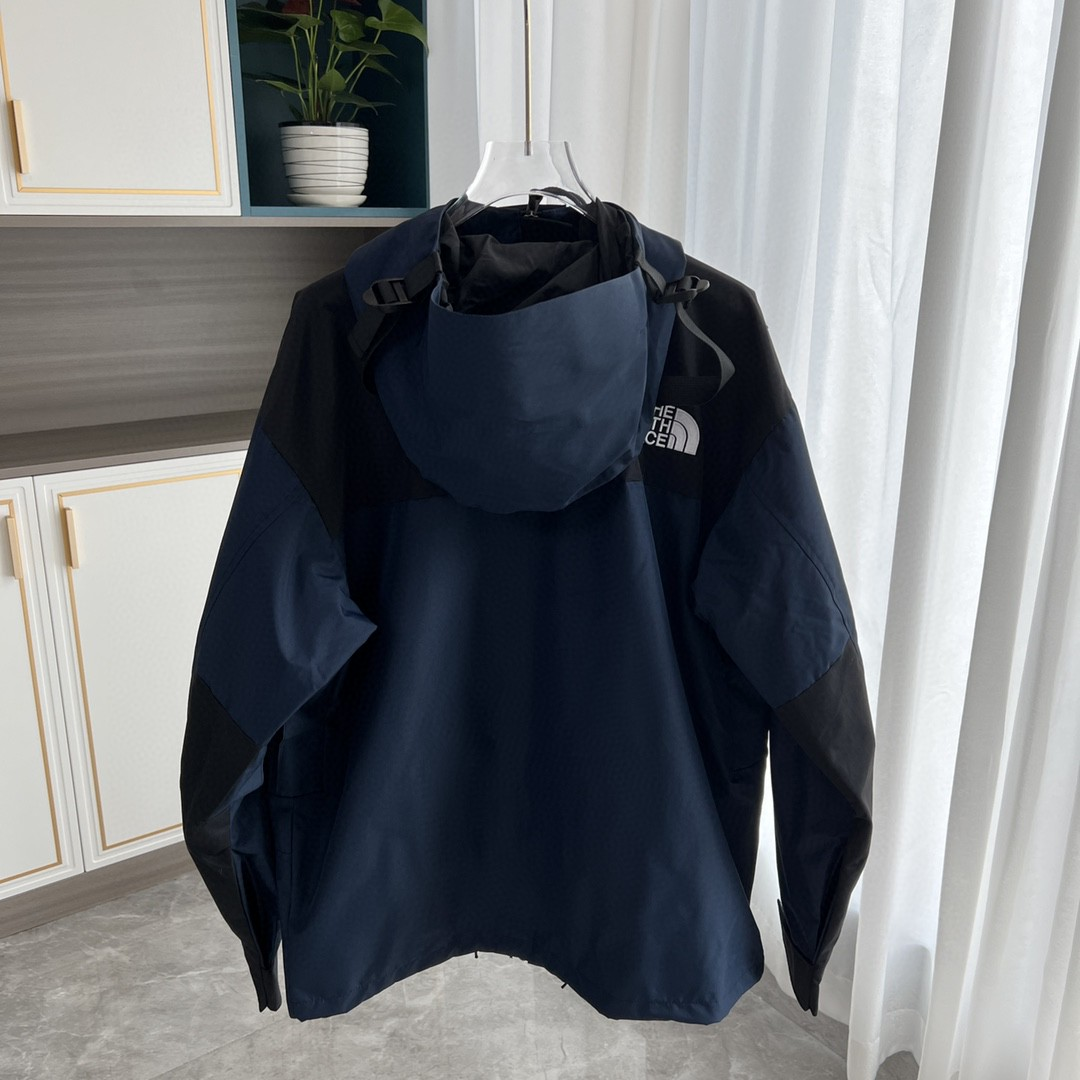 The North Face GORE-TEX Waterproof Hooded Mountain Jacket, Navy Blue and Black Colorblock Outdoor Windbreaker