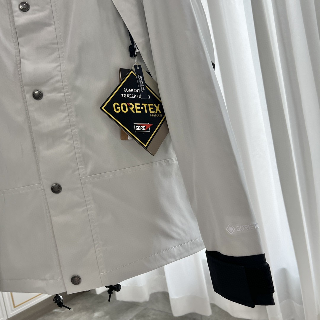 The North Face GORE-TEX Waterproof Hooded Mountain Jacket, Gray and Black Colorblock Outdoor Windbreaker