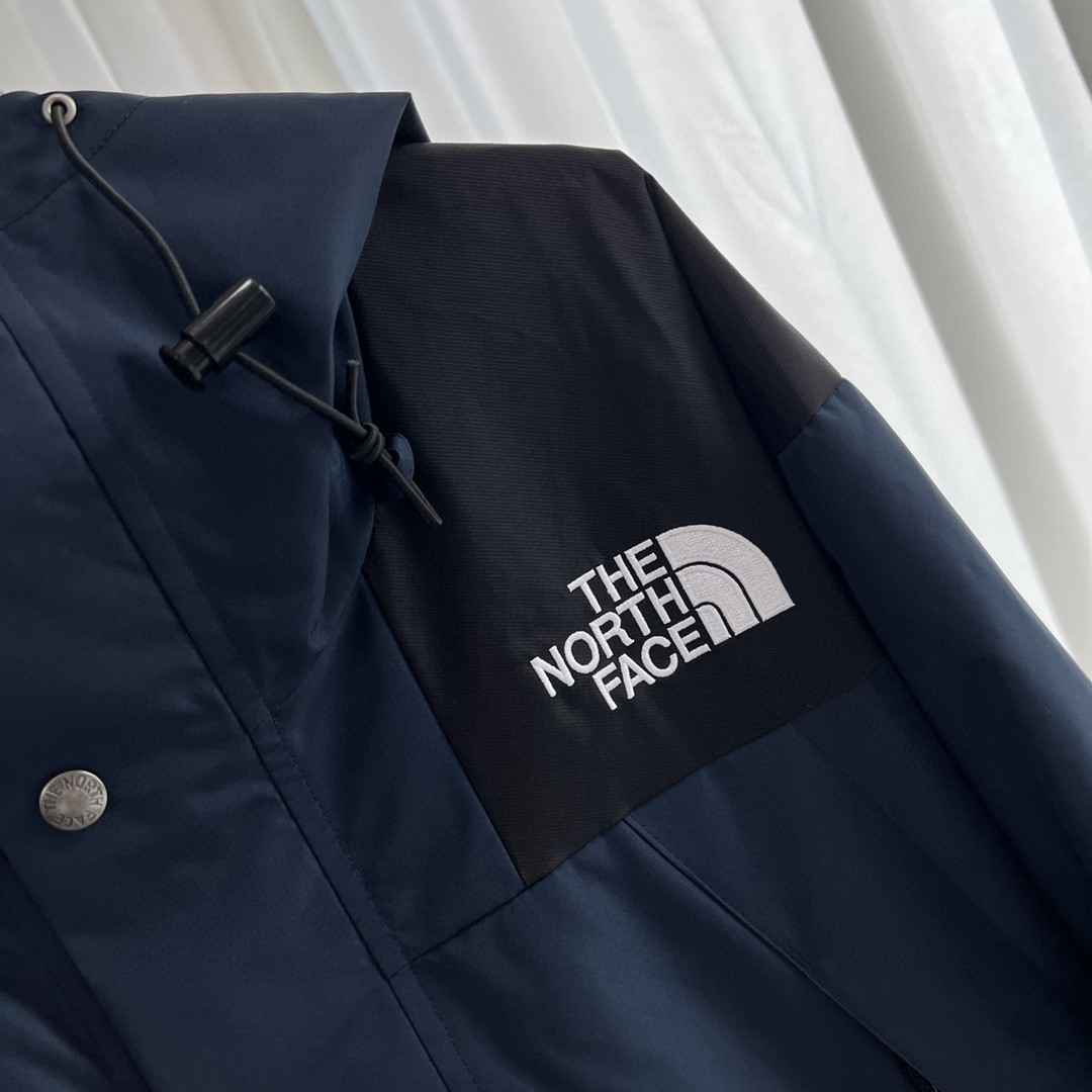The North Face GORE-TEX Waterproof Hooded Mountain Jacket, Navy Blue and Black Colorblock Outdoor Windbreaker