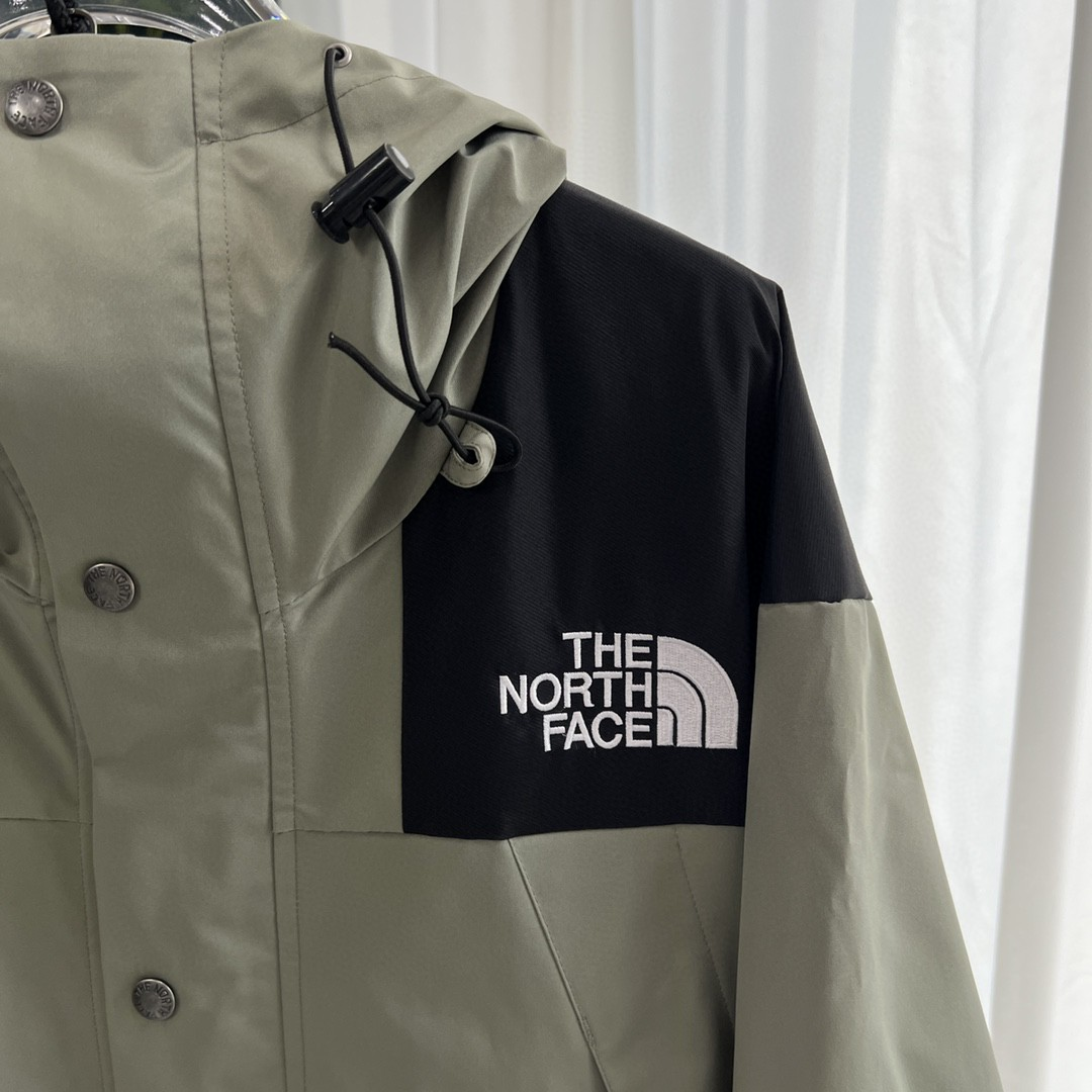 The North Face GORE-TEX Waterproof Hooded Mountain Jacket, Sage Green and Black Colorblock Outdoor Windbreaker