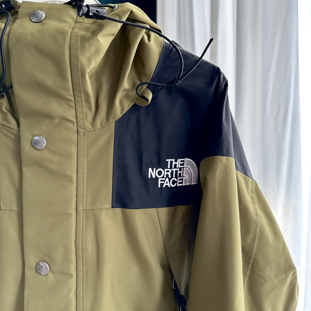 The North Face GORE-TEX Waterproof Hooded Mountain Jacket, Olive Green and Black Colorblock Outdoor Windbreaker