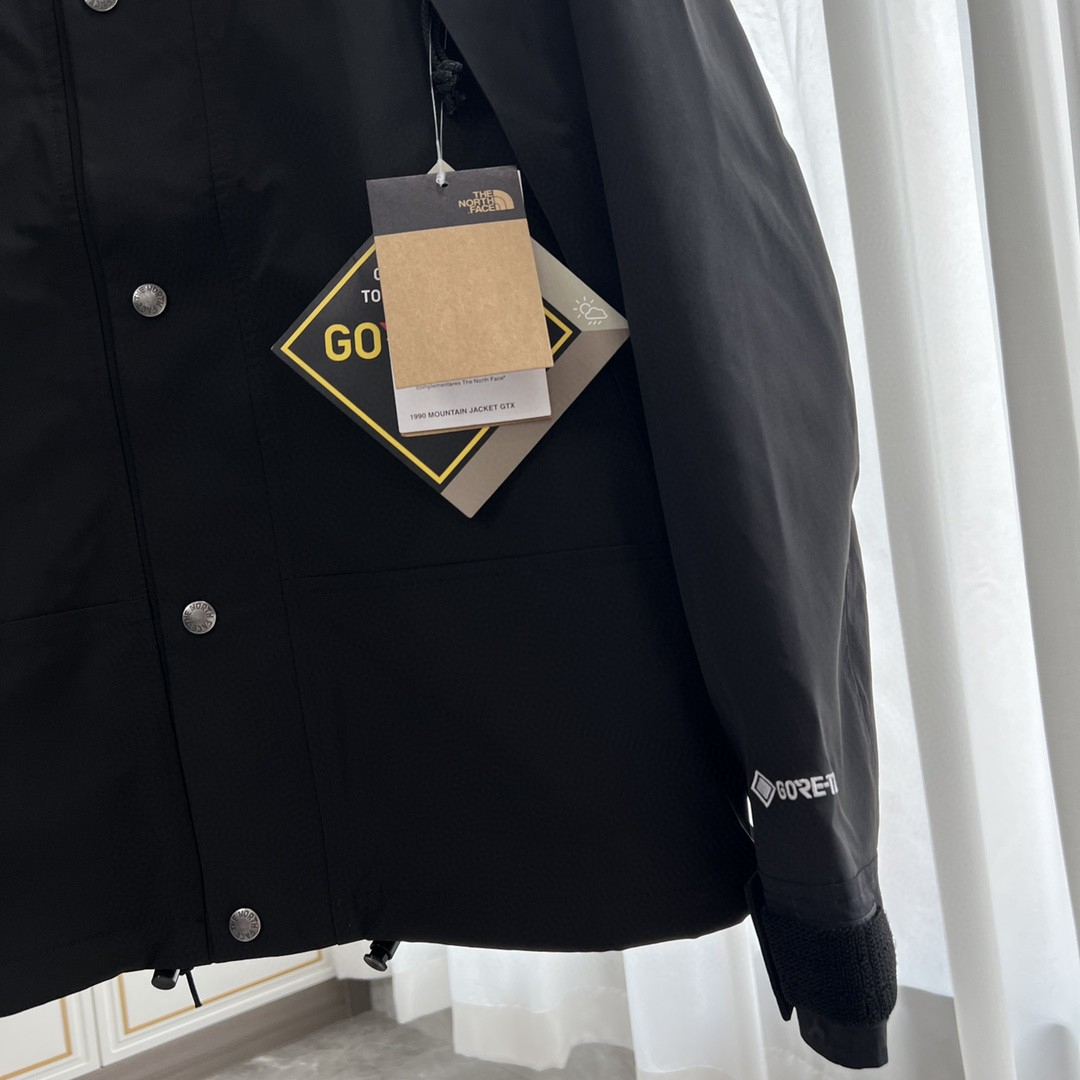 The North Face GORE-TEX Waterproof Hooded Mountain Jacket, All Black Outdoor Windbreaker with Embroidered Logo
