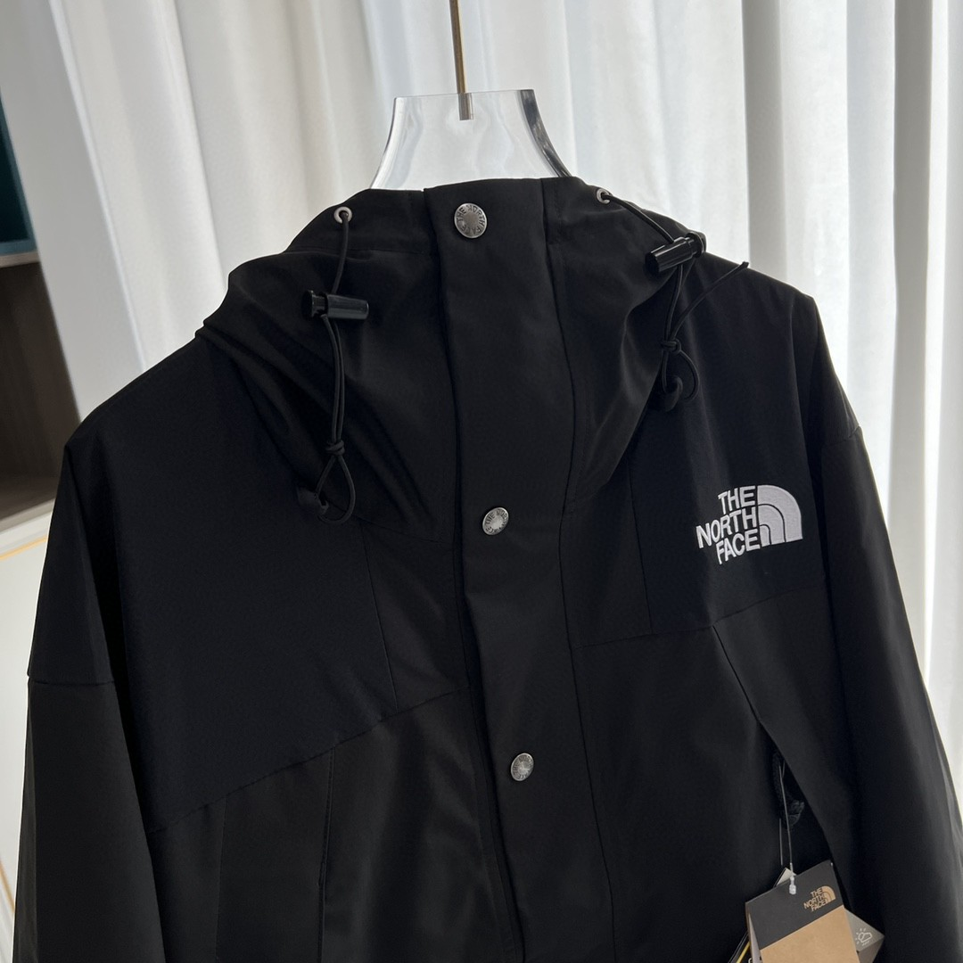 The North Face GORE-TEX Waterproof Hooded Mountain Jacket, All Black Outdoor Windbreaker with Embroidered Logo