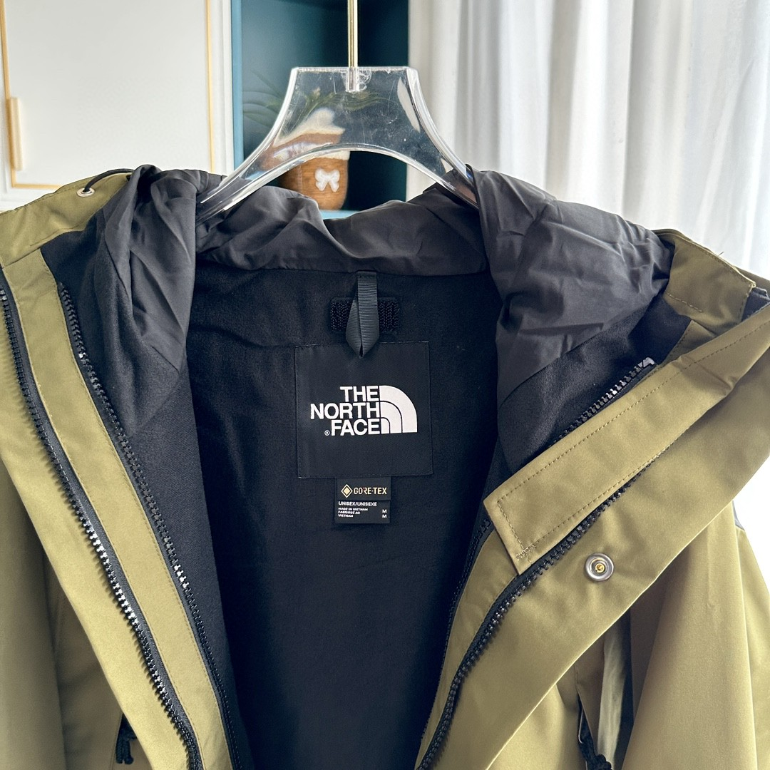 The North Face GORE-TEX Waterproof Hooded Mountain Jacket, Olive Green and Black Colorblock Outdoor Windbreaker