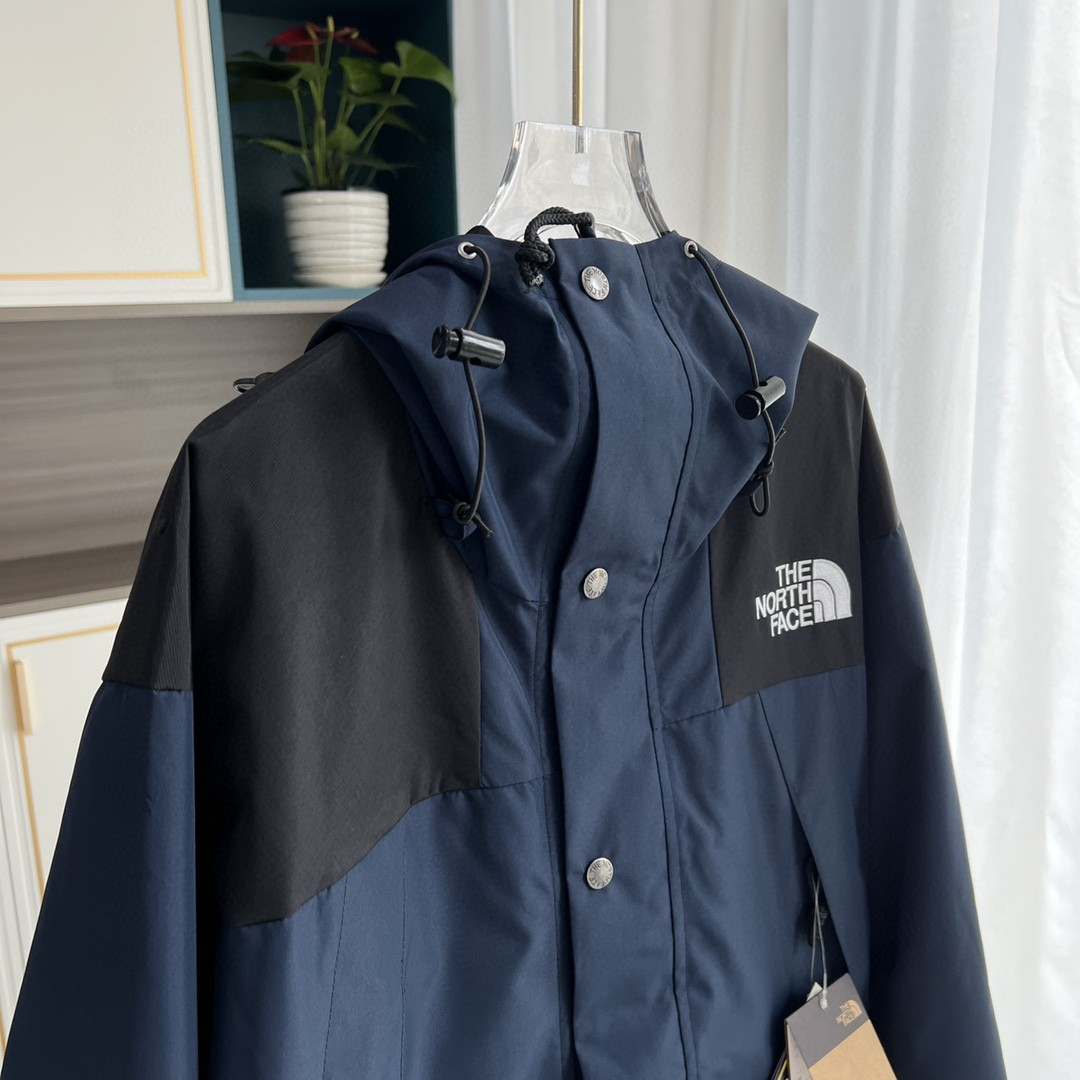 The North Face GORE-TEX Waterproof Hooded Mountain Jacket, Navy Blue and Black Colorblock Outdoor Windbreaker