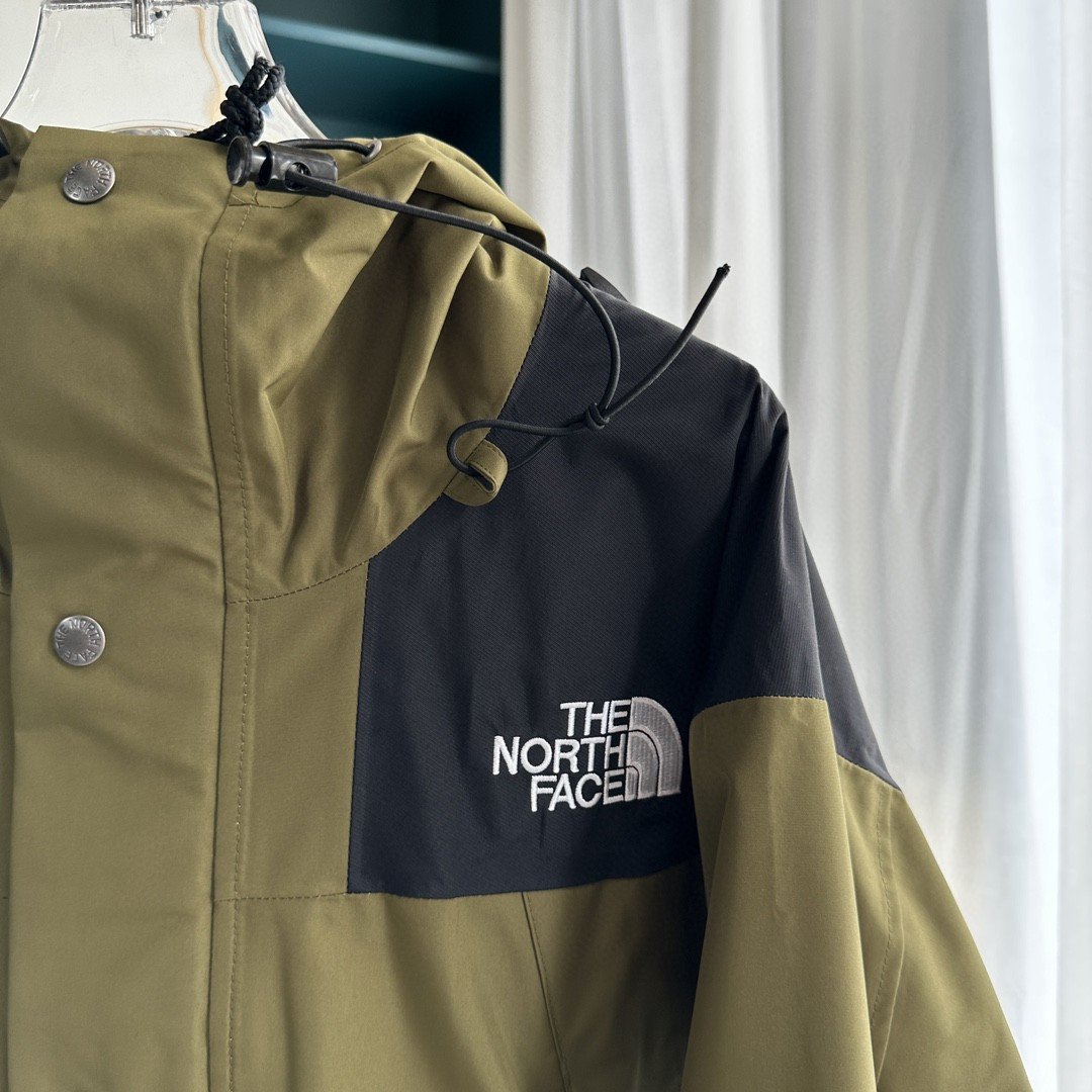 The North Face GORE-TEX Waterproof Hooded Mountain Jacket, Olive Green and Black Colorblock Outdoor Windbreaker
