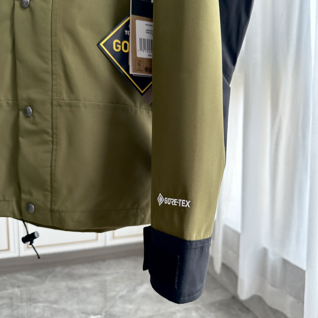 The North Face GORE-TEX Waterproof Hooded Mountain Jacket, Olive Green and Black Colorblock Outdoor Windbreaker