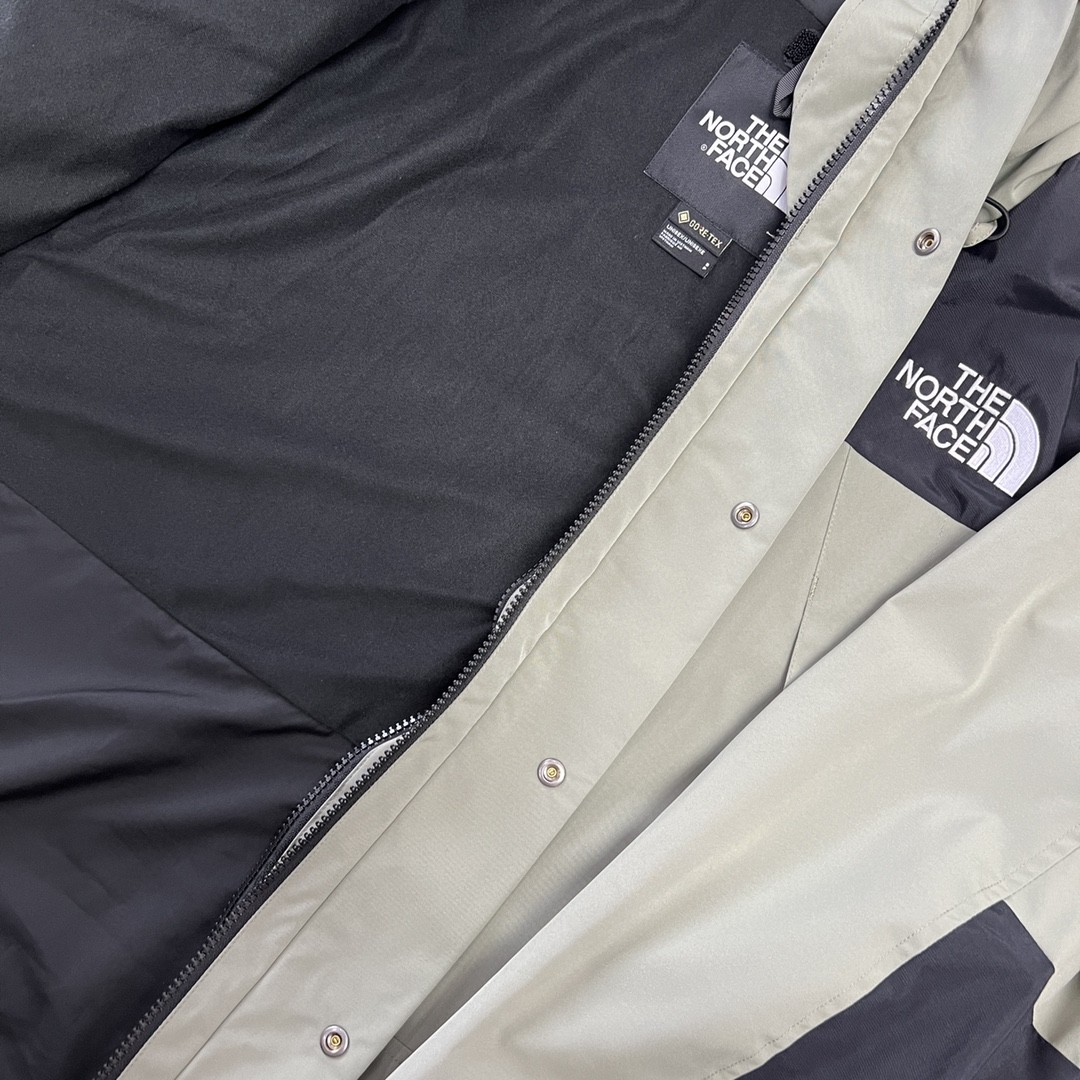 The North Face GORE-TEX Waterproof Hooded Mountain Jacket, Sage Green and Black Colorblock Outdoor Windbreaker