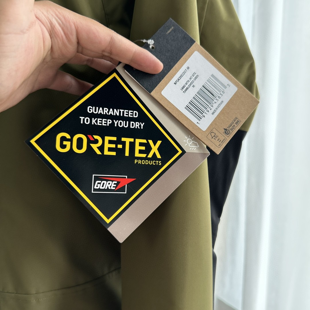 The North Face GORE-TEX Waterproof Hooded Mountain Jacket, Olive Green and Black Colorblock Outdoor Windbreaker